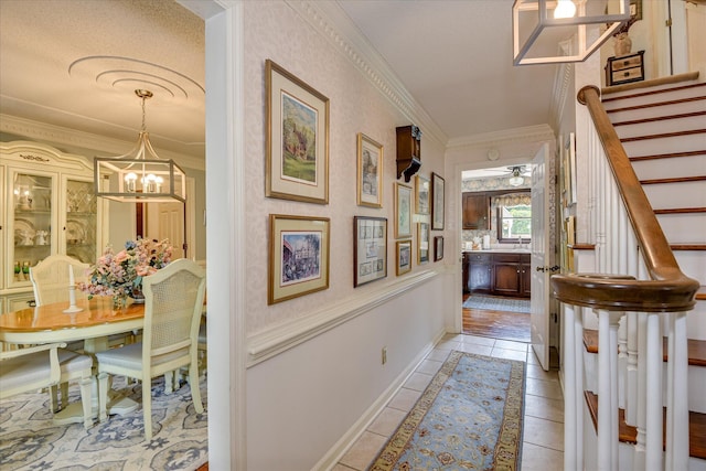 804 Camellia Rd, Augusta, GA 30909 - hall with a chandelier, stairway, and ornamental molding