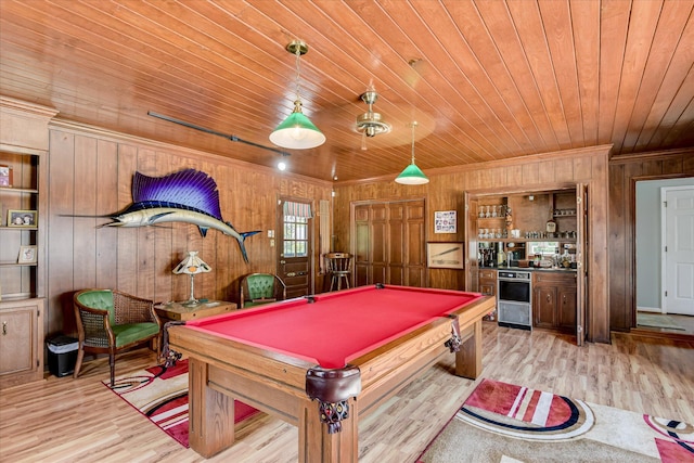 804 Camellia Rd, Augusta, GA 30909 - game room featuring wooden ceiling, wooden walls, bar, wood finished floors, and ornamental molding