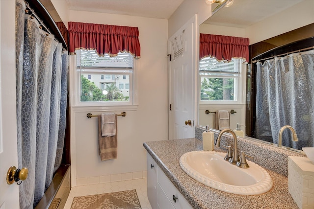 804 Camellia Rd, Augusta, GA 30909 - bathroom featuring vanity, healthy amount of natural light, tile patterned floors, and curtained shower