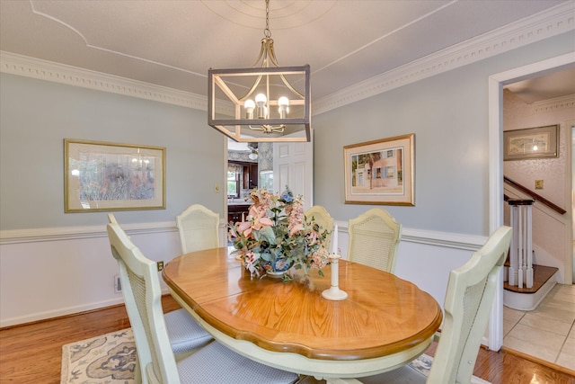 804 Camellia Rd, Augusta, GA 30909 - dining area featuring a chandelier, ornamental molding, and wood finished floors