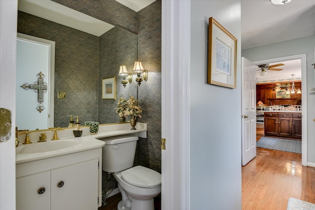 804 Camellia Rd, Augusta, GA 30909 - bathroom featuring wood finished floors, vanity, and ceiling fan