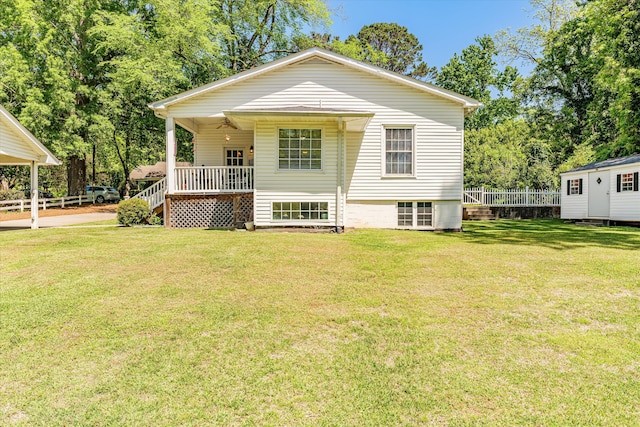 104 Sim St, Washington, GA 30673 - back of house with ceiling fan and an outdoor structure