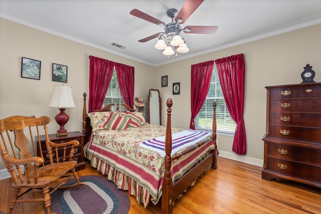 104 Sim St, Washington, GA 30673 - bedroom featuring crown molding, light wood finished floors, baseboards, and ceiling fan