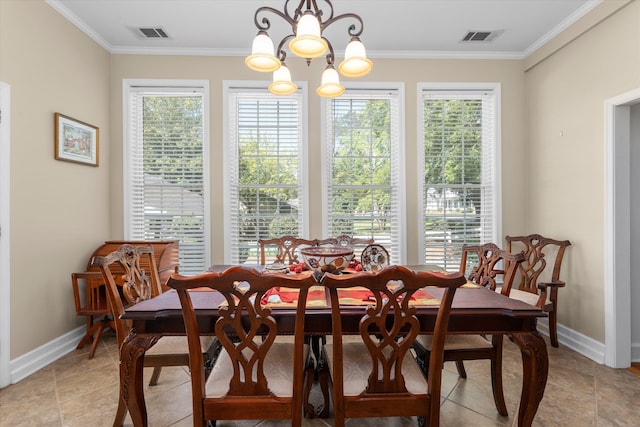 104 Sim St, Washington, GA 30673 - dining room featuring baseboards, a chandelier, and ornamental molding
