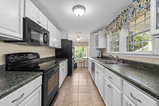 104 Sim St, Washington, GA 30673 - kitchen featuring black appliances, a sink, dark countertops, white cabinets, and light tile patterned flooring
