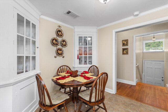 104 Sim St, Washington, GA 30673 - tiled dining area with ornamental molding and baseboards