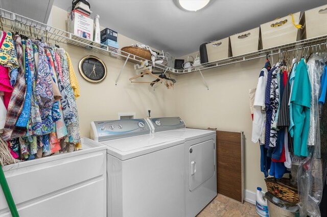 104 Sim St, Washington, GA 30673 - laundry area featuring washer and clothes dryer and baseboards