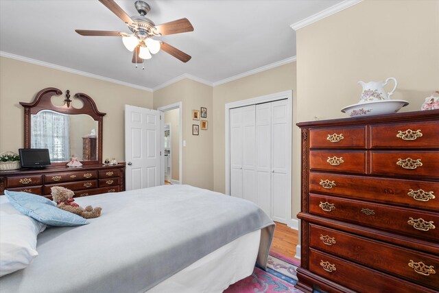 104 Sim St, Washington, GA 30673 - bedroom featuring ornamental molding, a closet, ceiling fan, and wood finished floors