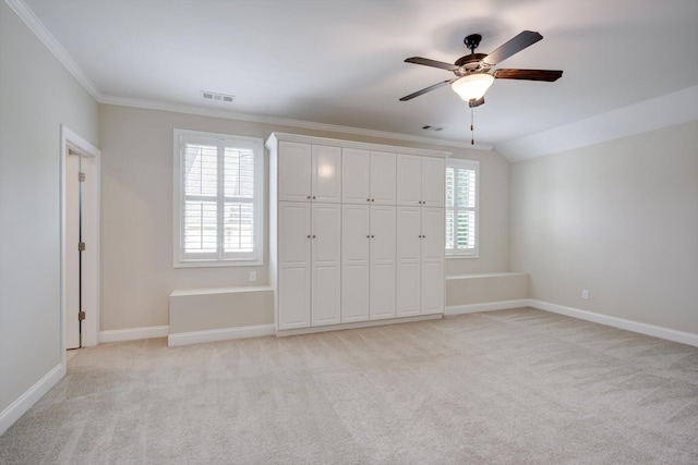 216 Dixon Ct, Evans, GA 30809 - unfurnished bedroom featuring light carpet, crown molding, multiple windows, ceiling fan, and a closet