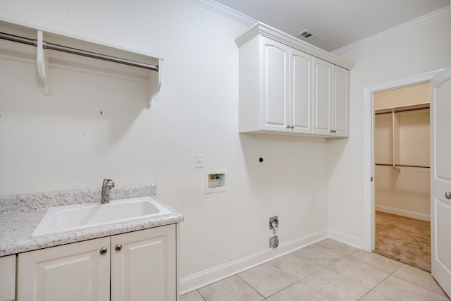 216 Dixon Ct, Evans, GA 30809 - laundry room with hookup for an electric dryer, cabinet space, washer hookup, crown molding, and light tile patterned flooring