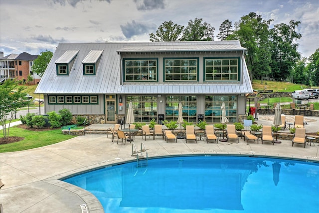 216 Dixon Ct, Evans, GA 30809 - community pool featuring a patio