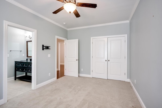216 Dixon Ct, Evans, GA 30809 - unfurnished bedroom featuring ornamental molding, carpet flooring, a closet, connected bathroom, and a ceiling fan