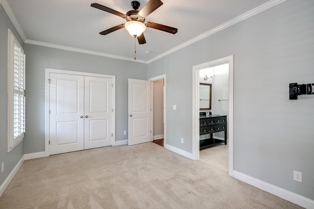 216 Dixon Ct, Evans, GA 30809 - unfurnished bedroom featuring ornamental molding, carpet floors, a closet, a ceiling fan, and ensuite bath