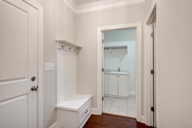 216 Dixon Ct, Evans, GA 30809 - mudroom with crown molding and dark wood-style floors