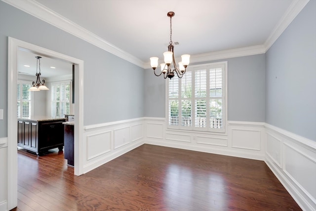 216 Dixon Ct, Evans, GA 30809 - empty room featuring wainscoting, ornamental molding, a chandelier, and dark wood-style floors