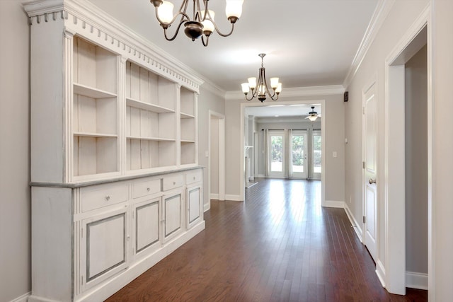 216 Dixon Ct, Evans, GA 30809 - corridor featuring a chandelier, dark wood-style floors, and crown molding