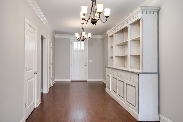 216 Dixon Ct, Evans, GA 30809 - unfurnished dining area featuring a chandelier, dark wood-style floors, and crown molding