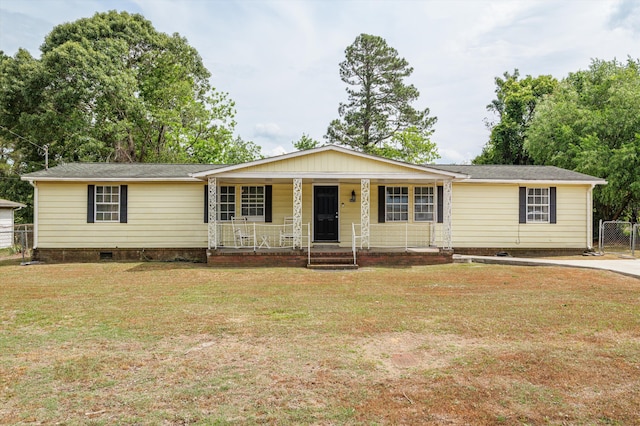 2410 Bell Ave, Hephzibah, GA 30815 - view of front facade featuring a porch, a front yard, and crawl space