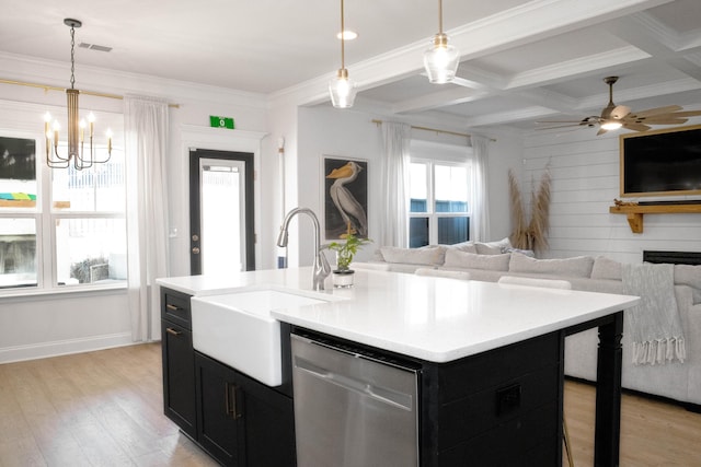 kitchen with a sink, open floor plan, stainless steel dishwasher, coffered ceiling, and dark cabinets