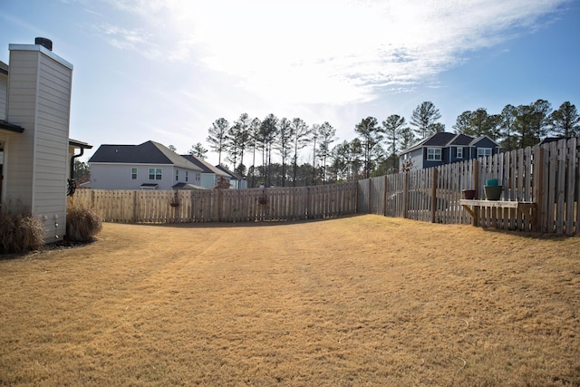 view of yard featuring a fenced backyard