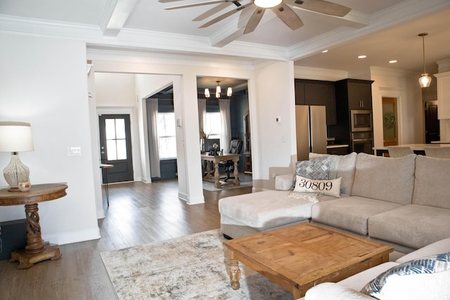 living area with dark wood-type flooring, baseboards, beamed ceiling, ornamental molding, and recessed lighting