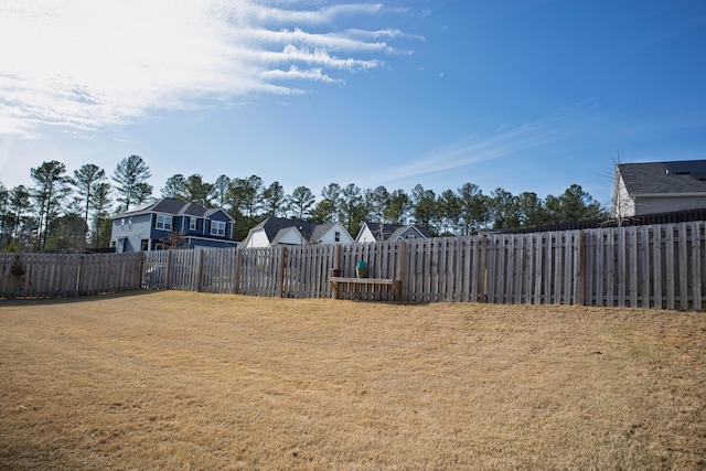 view of yard featuring a fenced backyard