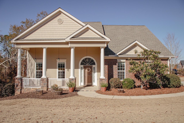 craftsman-style house with covered porch