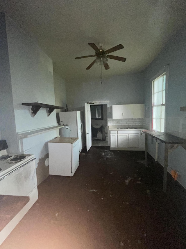 210-212 Perkins St, Augusta, GA 30904 - kitchen featuring white cabinets, a ceiling fan, fridge, electric stove, and light countertops