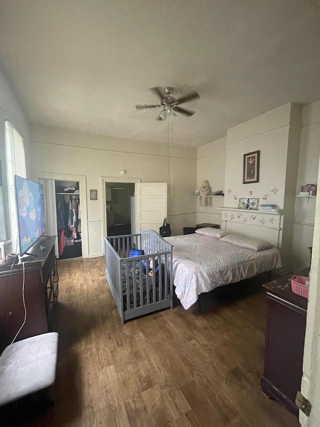 210-212 Perkins St, Augusta, GA 30904 - bedroom with wood finished floors, a closet, and a ceiling fan