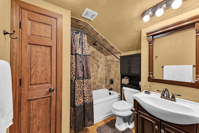 full bathroom with hardwood / wood-style floors, shower / bath combination with curtain, a textured ceiling, and vaulted ceiling