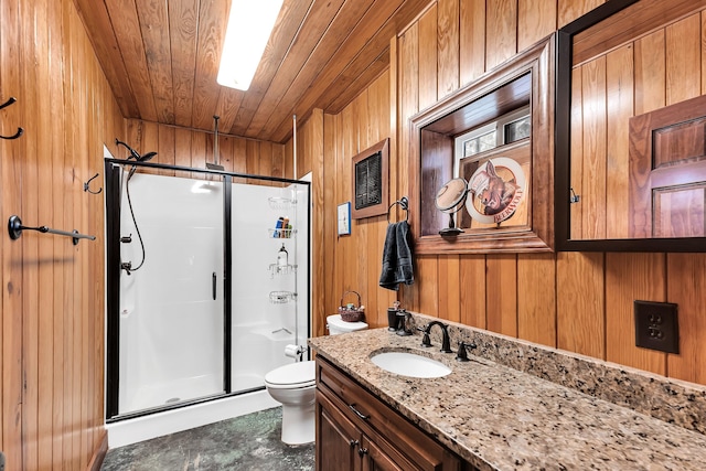 bathroom featuring wood ceiling, vanity, wooden walls, toilet, and a shower with shower door