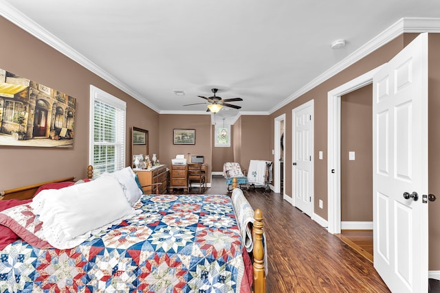 bedroom featuring dark hardwood / wood-style flooring, ceiling fan, and crown molding