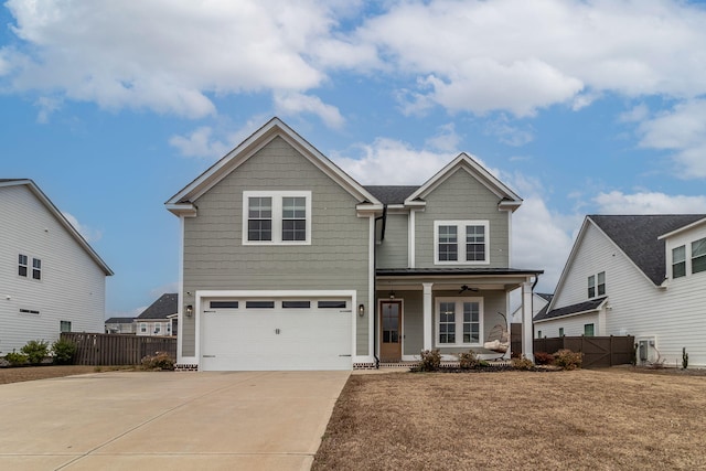 view of front of home featuring covered porch and a garage