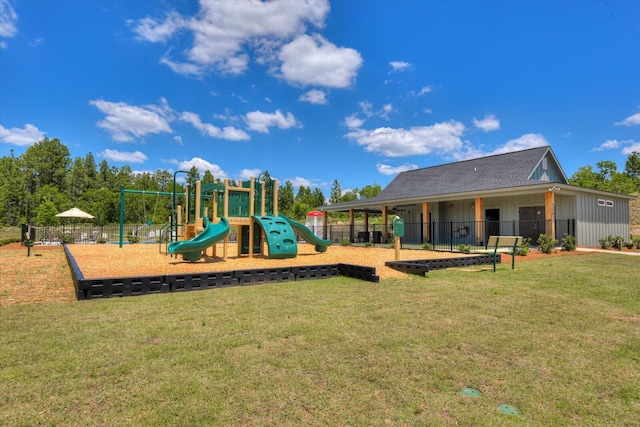 view of play area with a yard