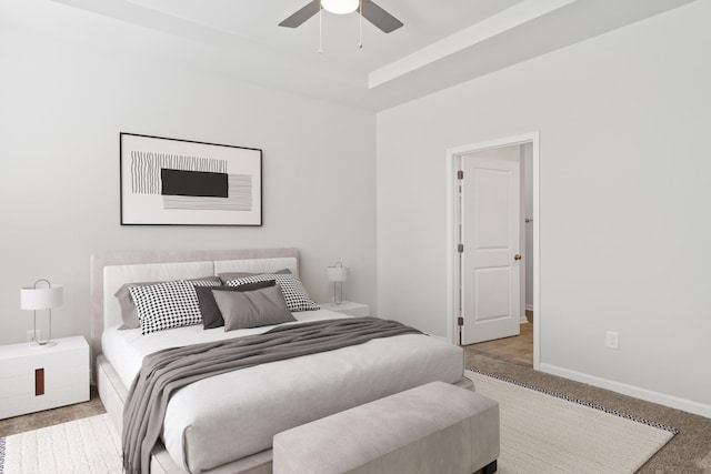 carpeted bedroom featuring ceiling fan