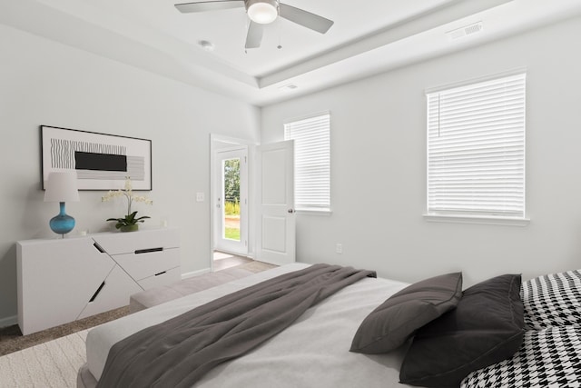 carpeted bedroom featuring ceiling fan