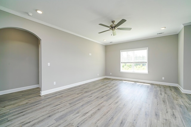 670 Jet Pass, Beech Island, SC 29842 - empty room with ceiling fan, crown molding, wood finished floors, arched walkways, and recessed lighting