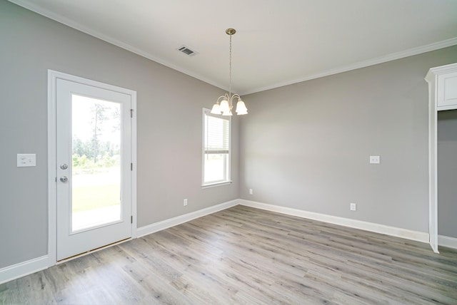 670 Jet Pass, Beech Island, SC 29842 - unfurnished dining area featuring a chandelier, crown molding, and light wood-style floors