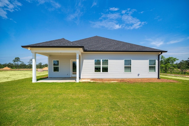 670 Jet Pass, Beech Island, SC 29842 - rear view of house featuring a patio area, roof with shingles, and a lawn