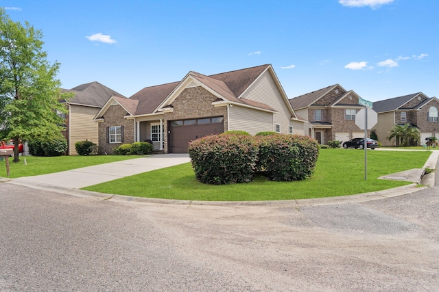 3044 Rockwell Ct, Graniteville, SC 29829 - view of front of house with an attached garage, a front lawn, brick siding, driveway, and a residential view