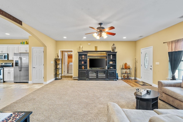 3044 Rockwell Ct, Graniteville, SC 29829 - living area with arched walkways, washer / dryer, a ceiling fan, light carpet, and recessed lighting