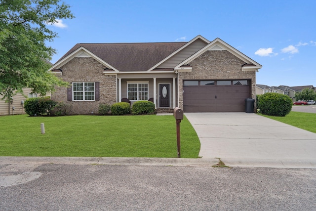 3044 Rockwell Ct, Graniteville, SC 29829 - view of front of house with brick siding, a front yard, an attached garage, and driveway