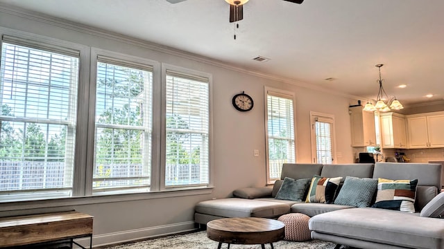 3113 Lobella Dr, Grovetown, GA 30813 - living room with plenty of natural light, a chandelier, a ceiling fan, and crown molding