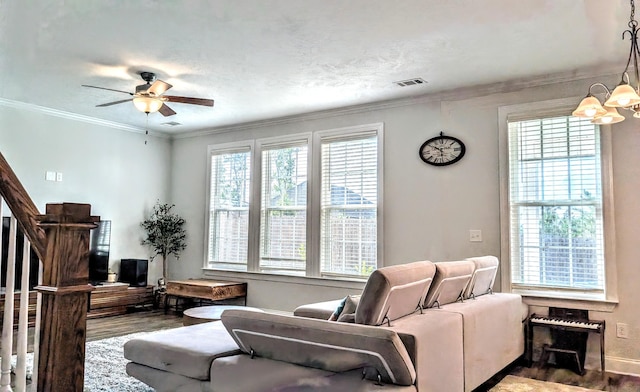 3113 Lobella Dr, Grovetown, GA 30813 - living area featuring healthy amount of natural light, ceiling fan, wood finished floors, and crown molding
