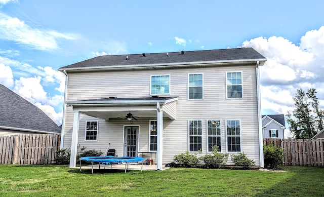 3113 Lobella Dr, Grovetown, GA 30813 - back of property with ceiling fan, a trampoline, and a fenced backyard