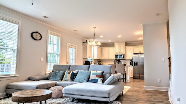 3113 Lobella Dr, Grovetown, GA 30813 - living room featuring a chandelier, dark wood finished floors, crown molding, and recessed lighting