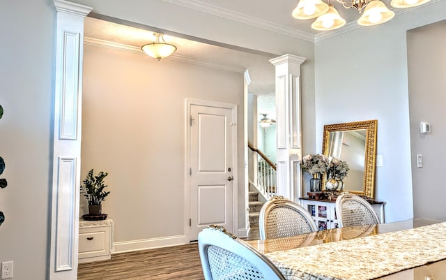 3113 Lobella Dr, Grovetown, GA 30813 - dining area with decorative columns, wood finished floors, stairs, a chandelier, and ornamental molding