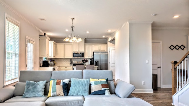 3113 Lobella Dr, Grovetown, GA 30813 - living room with a chandelier, dark wood-style floors, stairway, crown molding, and recessed lighting