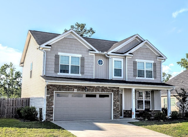 3113 Lobella Dr, Grovetown, GA 30813 - craftsman-style home with driveway, an attached garage, stone siding, board and batten siding, and a porch