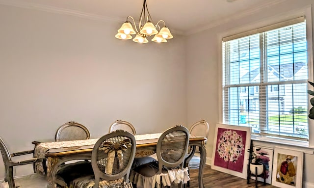3113 Lobella Dr, Grovetown, GA 30813 - dining room featuring a chandelier, ornamental molding, and dark wood-type flooring